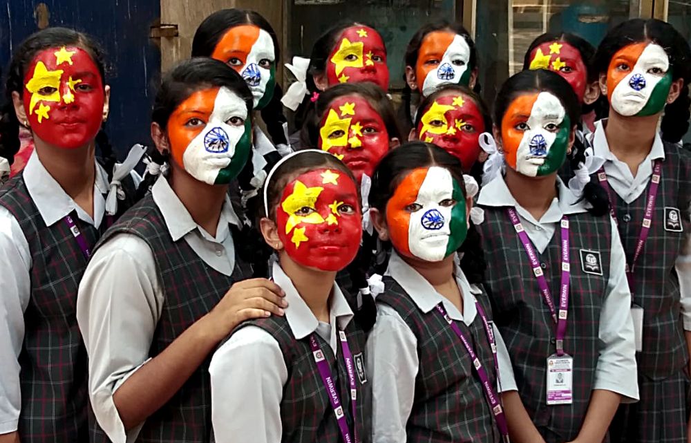 ANI-file-photo-Indian-students-with-flags-of-India-China-upl.jpg