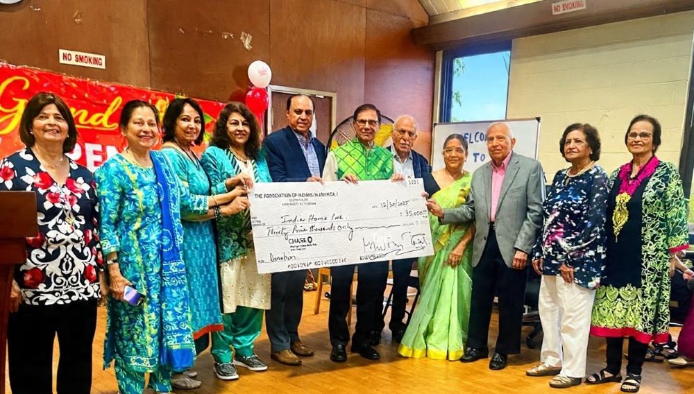 AIA-Past-Presidents-and-NEC-presenting-35000-check-to-India-Home-upl.jpg