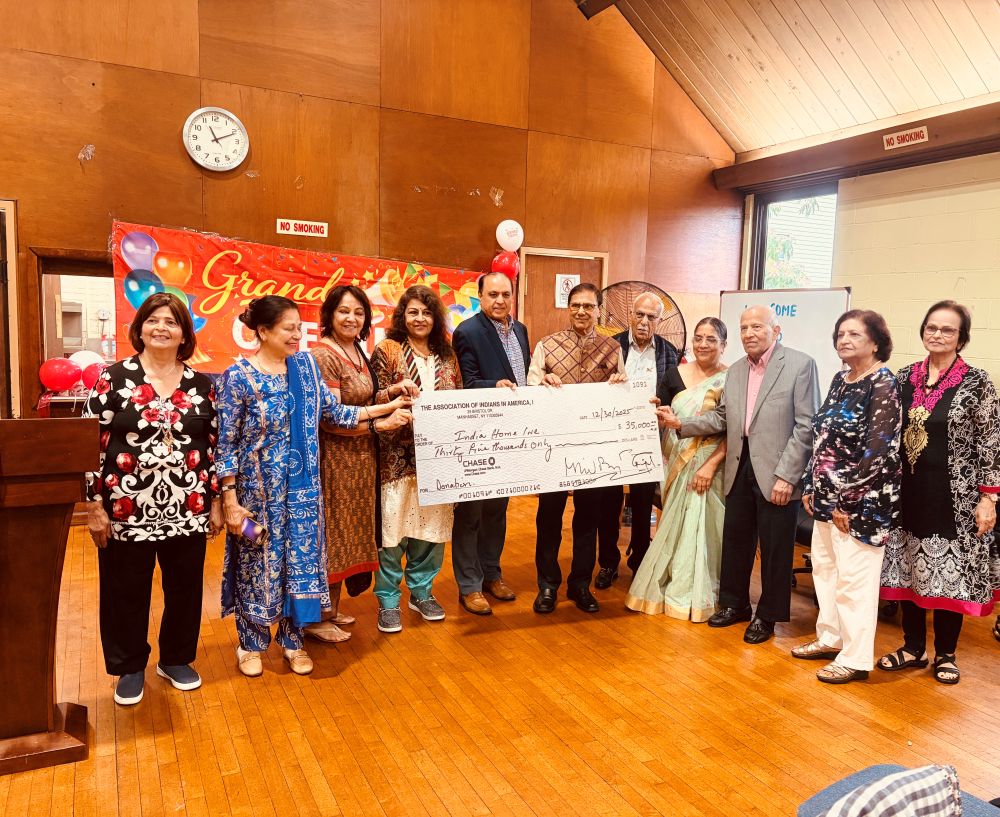 Picture-1-AIA-Past-Presidents-and-NEC-Members-presenting-a-35000-check-to-India-Home-upl.jpg
