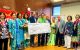AIA-Past-Presidents-and-NEC-presenting-35000-check-to-India-Home-upl.jpg
