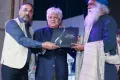 Mahakumbh-book-release-by-Sadhguru-at-IAAC-Literary-Festival-author-Yakub-Mathew-left-and-Suhel-Seth-who-mdoerated-the-panel-discussion-at-the-book-launch.webp